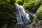 Irina Waterfall in the Republic of Abkhazia. A clear sunny day on May 20, 2021