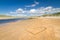 Irish beach with love heart sign