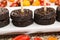 Irish black pudding as party snack on a white plate