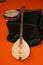 Irish bouzouki in the foreground and bodhran in the background