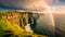 Irish Cliff\\\'s Radiant Secret: A Majestic Rainbow Graces the Coastal Horizon