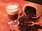 Irish coffee in glass on wooden table. Alcoholic or non-alcoholic