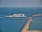 An Irish Ferries cross channel ferry approaches the entrance to the Port of Dover.