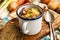 Irish lamb stew served in an blue and white enamel cup