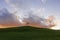 Irish landscape. Ireland. The lonely tree. Isolated tree on the top of a hill. Cloudscape