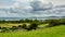 Irish landscape of sea, meadows and farms