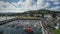 Irish ocean pier town aerial view: port landscape of yachts, ships at mountains. Epic nature scene