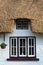 Irish thatched cottage windows close up