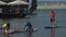 Irkutsk, Russia - August 3 2019: Baikal Jet Fest, BJF. Athlete and dog up paddleboard sup holding paddle board up