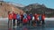 IRKUTSK, RUSSIA - MARCH 08, 2021: Group portrait of expedition members on ice covered surface of frozen lake. Happy