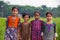 irls from the rural village are happy to be captured in a frame. Young girls standing with a big smile on their face