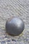 Iron ball on cobblestone