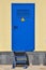 Iron blue door of a transformer box. Electricity, high voltage, do not enter the danger zone