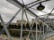 Iron bridge structure and a lamp with a look to Parisian buildings, France