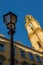 Iron cast street lamp with Theatiner church in munich