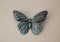 Iron close up butterfly brooch