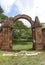 Iron door and stone walls of colonial coffe plantation