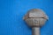 Iron dumbbell 5 kilograms on blue yoga mat