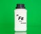 Iron Fe chemical element in a laboratory plastic container