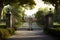 iron mansion gates, with view of manicured lawns and towering trees, in peaceful country setting