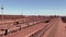 Iron ore filed railway wagons arriving at Saldanha Bay South Africa