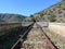 iron road bridges metal rail light at the end of the tunnel train transport