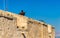 Iron statue of a medieval warrior at Santa Barbara Castle in Alicante, Spain