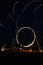 Iron wool circle drawing light fireworks. Burning Steel Wool spinning, Trajectories of burning sparks at night. Movement light eff