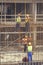 Iron workers tying reinforcing rebar 5