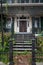 Ironwork entrance to overgrown large house in Winchester VA