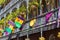 Ironwork galleries on the Streets of French Quarter decorated for Mardi Gras in New Orleans, Louisiana