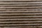 Irregular rough  grooved white background texture of wood linear lines