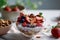 irresistible combination of creamy yogurt adorned with colorful assortment of fresh berries and crunchy nuts, all served