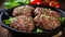 Irresistible grilled juicy meat burger patty sizzling and browning to perfection on a hot pan