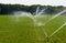 Irrigating grassland in summer