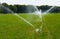 Irrigating grassland in summer