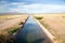 Irrigation Ditch with Flowing Water