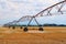 Irrigation plant machine structure field cultivation water drought sun panorama