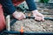 Irrigation system on the site. Hands attach a hose to a tap