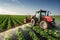 irrigation tractor driving spraying or harvesting an agricultural crop