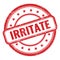 IRRITATE text on red grungy vintage round stamp
