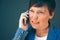 Irritated angry business woman during mobile phone conversation