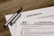 IRS form W-9 and a contract