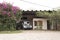 Irurtia vineyards: old Bedford truck, construction and flowered bougainvillea