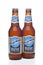 IRVINE, CALIFORNIA - 12 JUNE 2020: Two cold bottles of Blue Moon Belgian White Wheat Ale with condensation isolated on white with