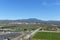 IRVINE, CALIFORNIA - 31 JAN 2020: Aerial view of the Soccer Stadium, Softball Stadium and Tennis Facility with Saddleback peak