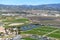IRVINE, CALIFORNIA - 31 JAN 2020: Aerial view of the Tennis Facility, Soccer Fields with new homes and the santa Ana Mountains in