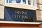 IRVINE, CALIFORNIA - 6 JULY 2023: Irvine City Hall sign over the entrance at the Civic Center