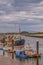 Irvine Harbour in Ayrshire Scotland looking Over some Small Boats Including the Old Puffer Kyles