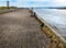 Irvine Harbour pier with monoblock and iron bollards